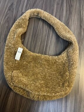Anthropologie Faux Shearling sling bag